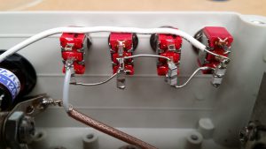 Pairs of series connected ATC800B porcelain SMD capacitors work much better