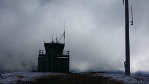The fire watch tower at the summit of Mt Hotham together with the comms pole. For interest, the antenna visible part way up the pole is the VK3RHO repeater antenna.